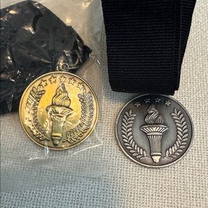 Mary Kay Gold/Silver Medal Pendants with Black Ribbon.